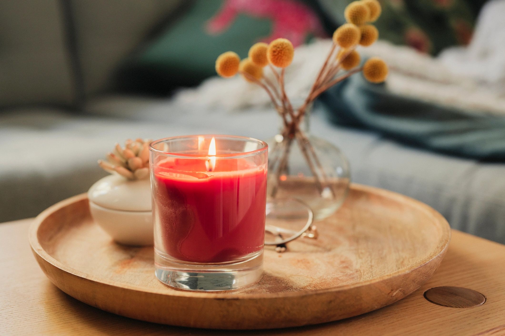 A colorful assortment of handcrafted beeswax candles shaped beautifully.